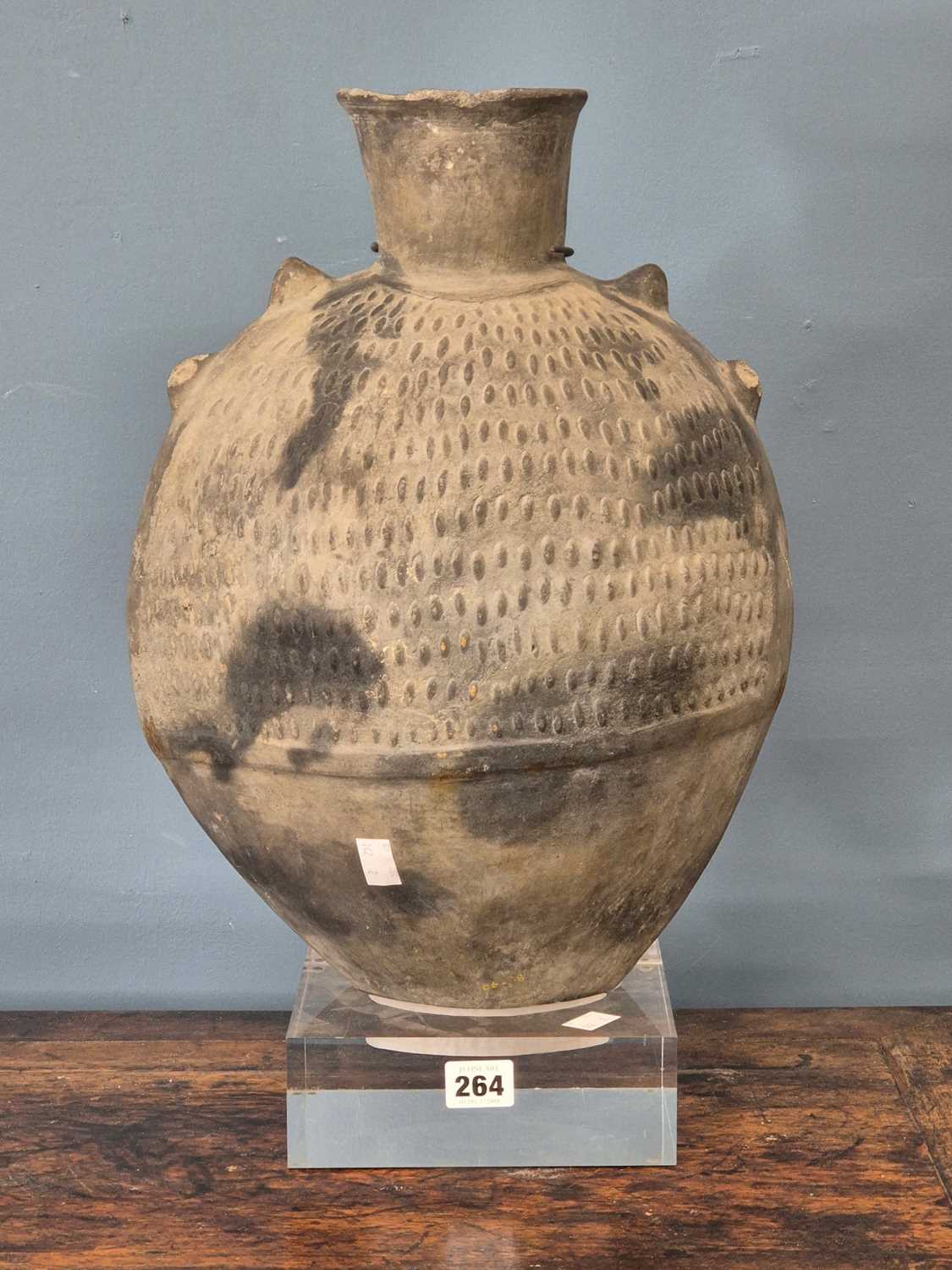 Lot 264 - A Chimu grey pottery flattened ovoid vase...