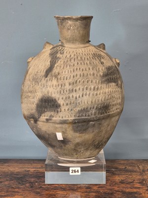 Lot 264 - A Chimu grey pottery flattened ovoid vase...