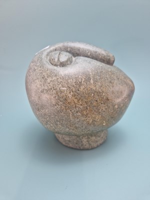 Lot 294 - A Shona green stone head carved by Fanizani...