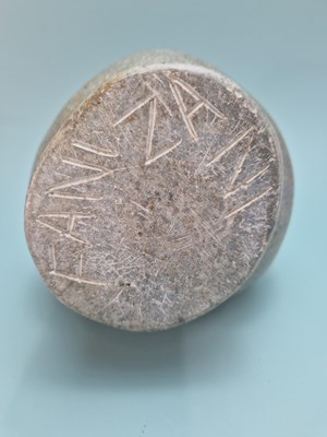 Lot 294 - A Shona green stone head carved by Fanizani...