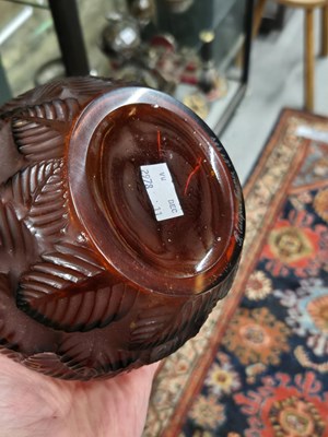 Lot 299 - A Lalique deep amber Feuilles Votive pattern...