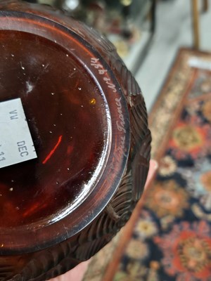Lot 299 - A Lalique deep amber Feuilles Votive pattern...