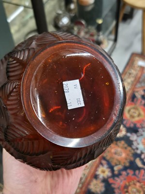 Lot 299 - A Lalique deep amber Feuilles Votive pattern...