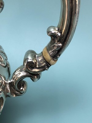 Lot 326 - A Victorian silver three piece tea set by...