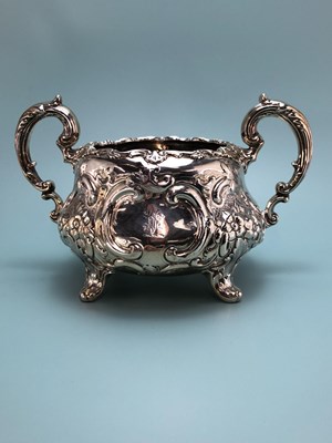 Lot 326 - A Victorian silver three piece tea set by...