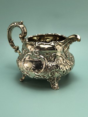 Lot 326 - A Victorian silver three piece tea set by...