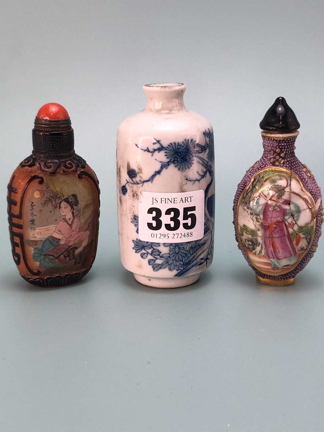 Lot 335 - Three Chinese snuff bottles, one of interior...