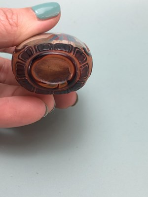 Lot 335 - Three Chinese snuff bottles, one of interior...