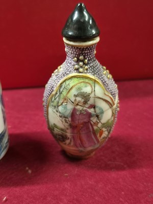 Lot 335 - Three Chinese snuff bottles, one of interior...