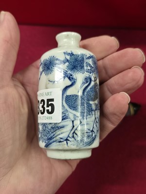 Lot 335 - Three Chinese snuff bottles, one of interior...