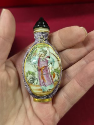 Lot 335 - Three Chinese snuff bottles, one of interior...