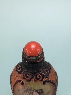 Lot 335 - Three Chinese snuff bottles, one of interior...