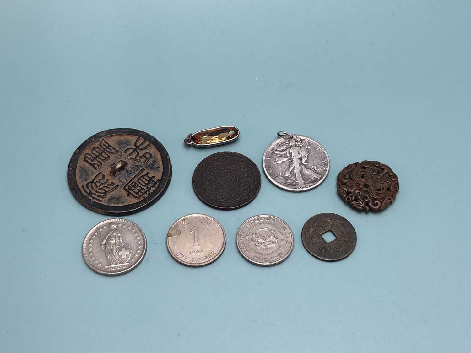 Lot 339 - A 1934 American half dollar pendant, a 1988...