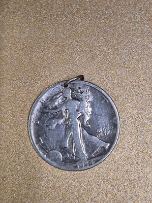 Lot 339 - A 1934 American half dollar pendant, a 1988...
