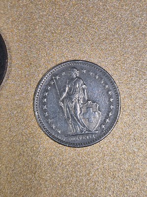 Lot 339 - A 1934 American half dollar pendant, a 1988...