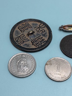 Lot 339 - A 1934 American half dollar pendant, a 1988...