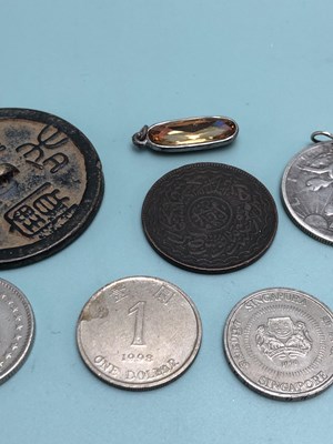 Lot 339 - A 1934 American half dollar pendant, a 1988...