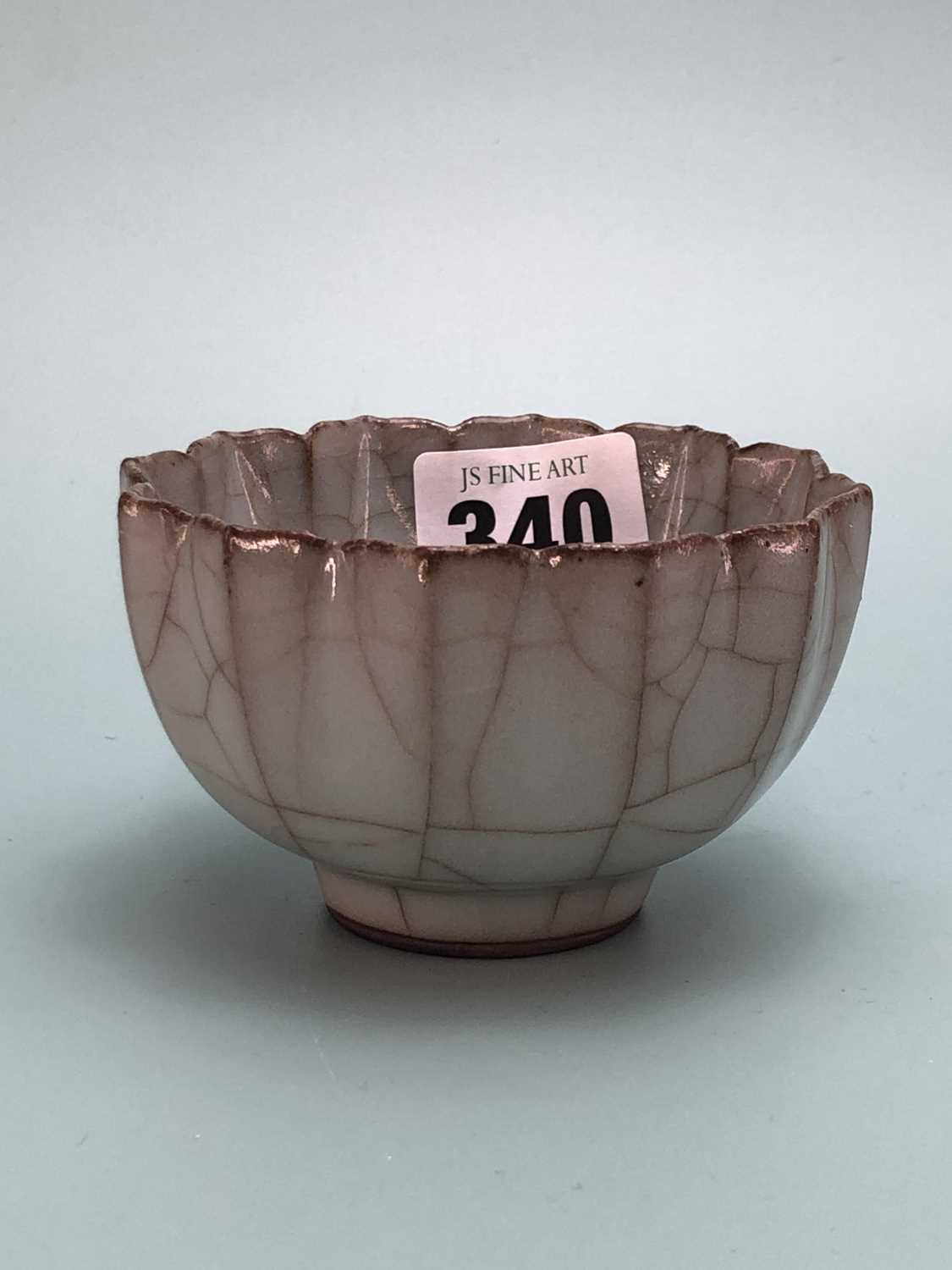 Lot 340 - A Chinese guan ware fluted bowl with a chevron...