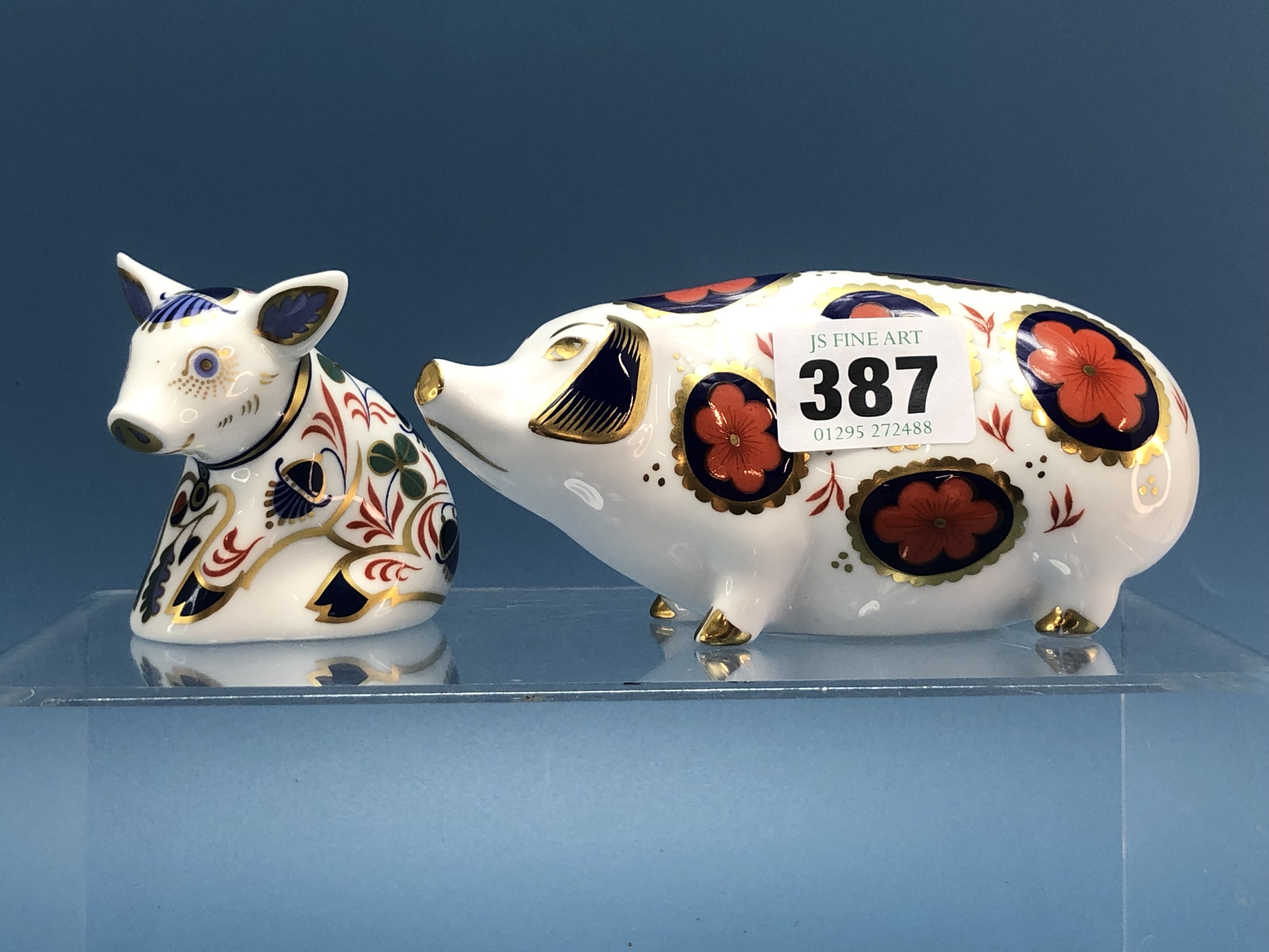 Lot 387 - A Royal Crown Derby paperweight figure of a