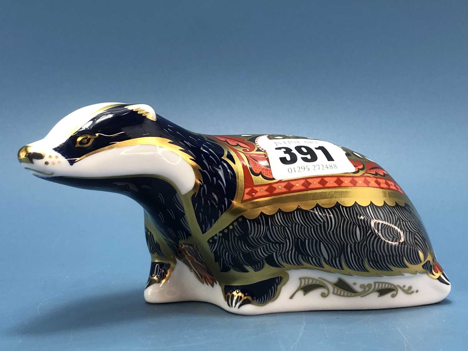 Lot 391 - A Royal Crown Derby paperweight figure of a...