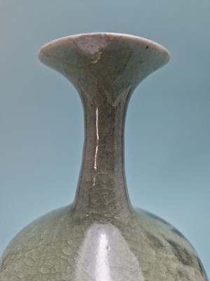 Lot 449 - An unmarked crackled celadon studio bottle...