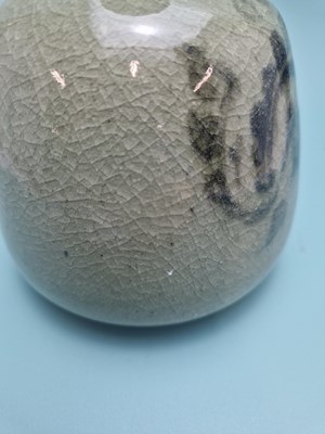 Lot 449 - An unmarked crackled celadon studio bottle...