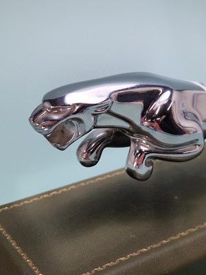 Lot 457 - A chrome desk paperweight in the form of a...