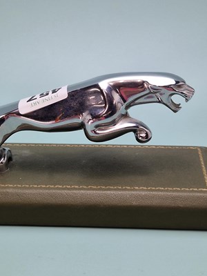 Lot 457 - A chrome desk paperweight in the form of a...