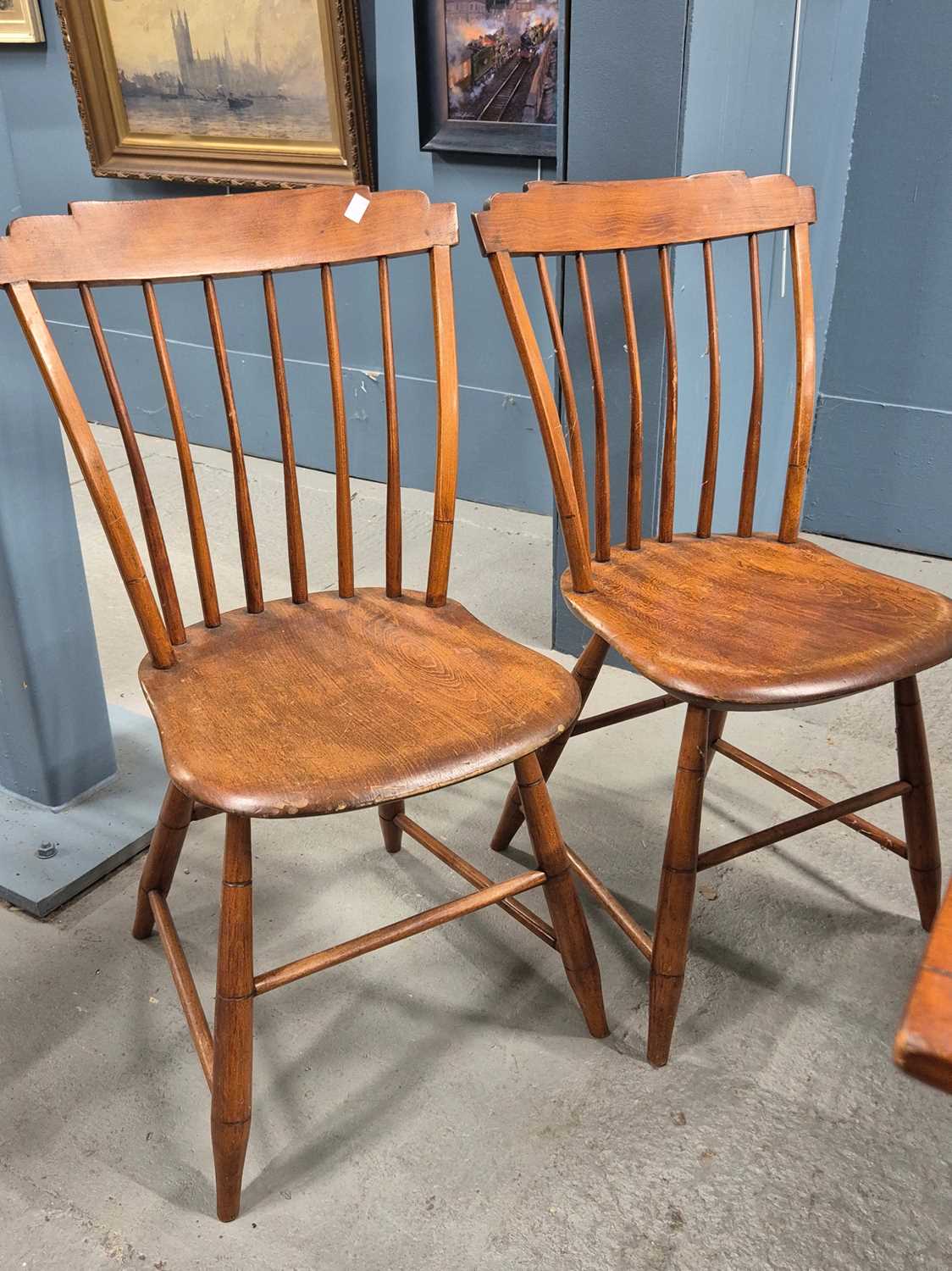 Lot 475 - A set of eight American stick-back chairs,...