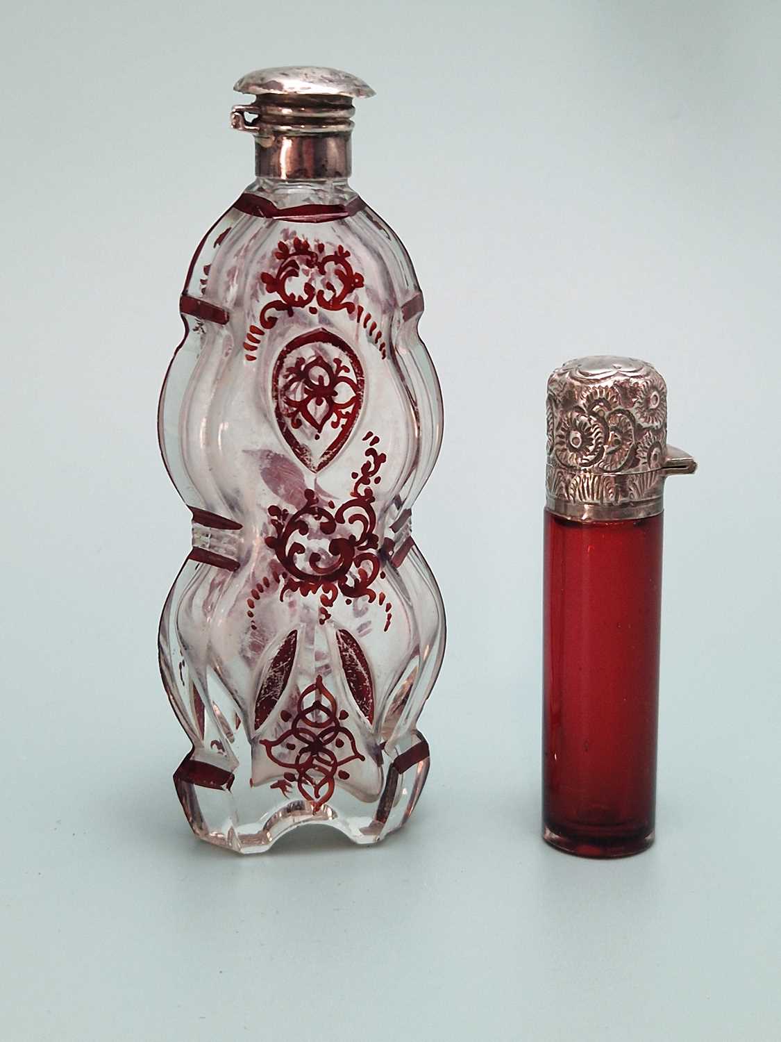 Lot 482 - A ruby overlay clear glass scent bottle...