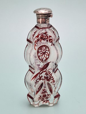 Lot 482 - A ruby overlay clear glass scent bottle...