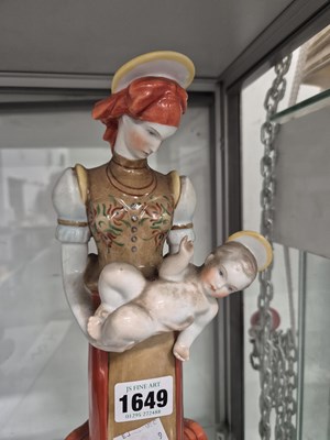 Lot 1649 - A Herend porcelain standing Madonna holding...