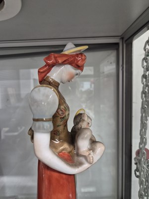 Lot 1649 - A Herend porcelain standing Madonna holding...