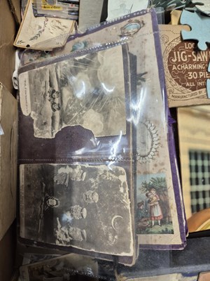 Lot 1793 - Children's books, jigsaw puzzles, photographs,...