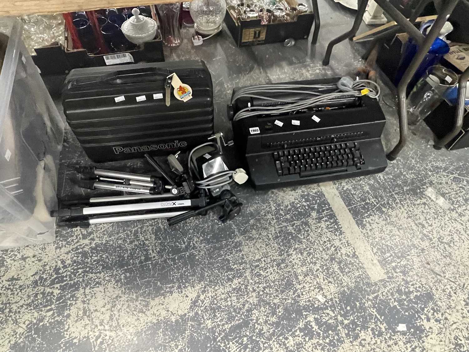 Lot 1960 - A cased Panasonic VHS movie camera, tripods, a...