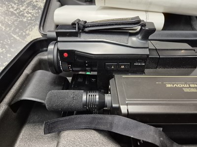 Lot 1960 - A cased Panasonic VHS movie camera, tripods, a...