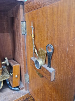 Lot 802 - A mahogany cased brass barreled microscope...
