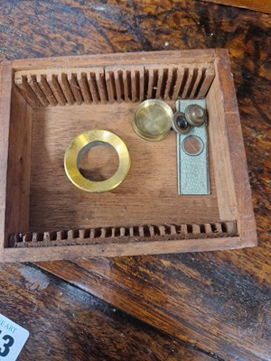 Lot 802 - A mahogany cased brass barreled microscope...