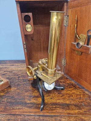 Lot 802 - A mahogany cased brass barreled microscope...