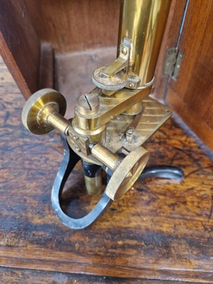 Lot 802 - A mahogany cased brass barreled microscope...