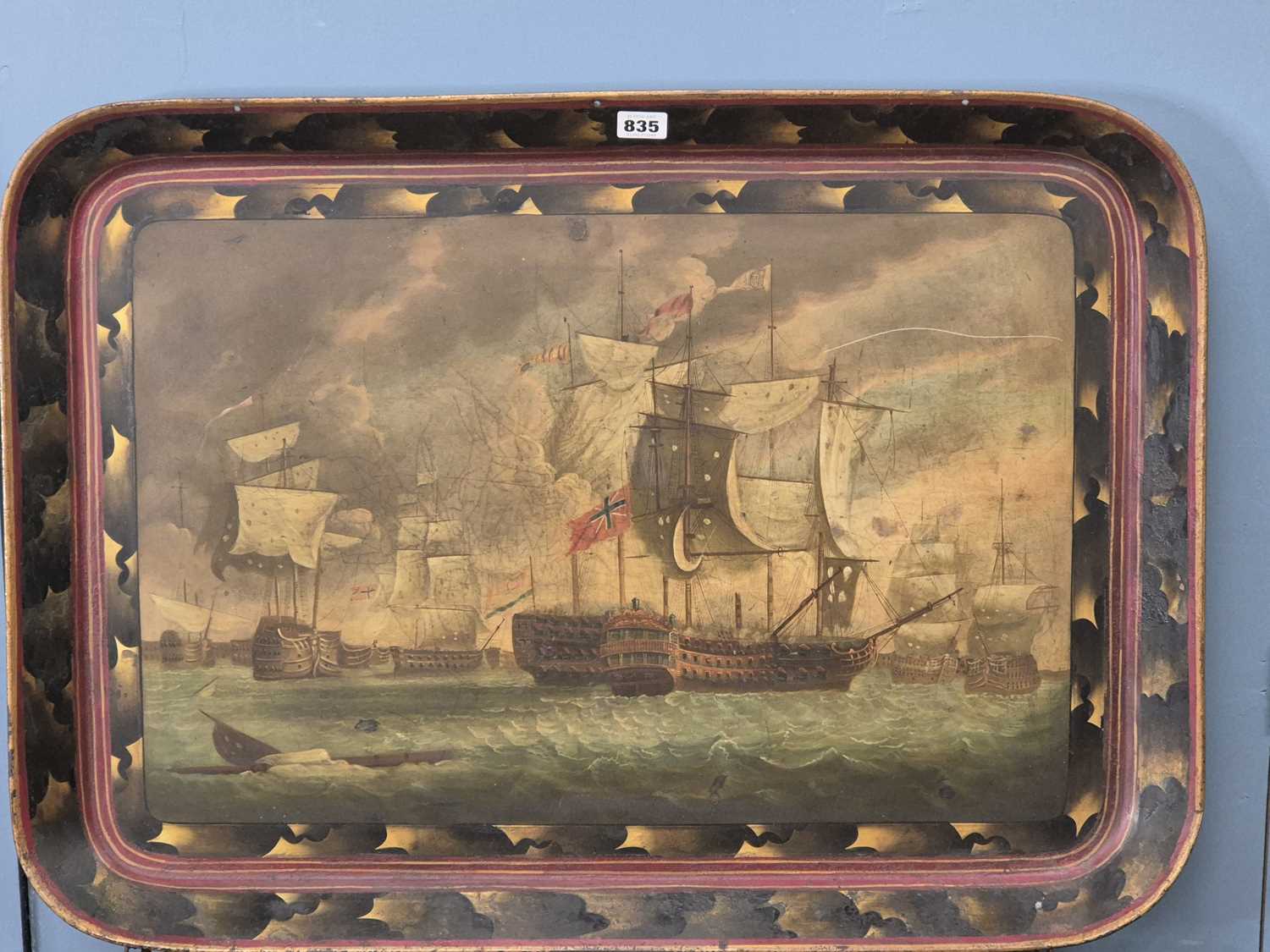Lot 835 - A 19th century tole tray painted with British...