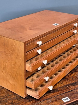 Lot 858 - A plywood coin collectors chest of six fitted...