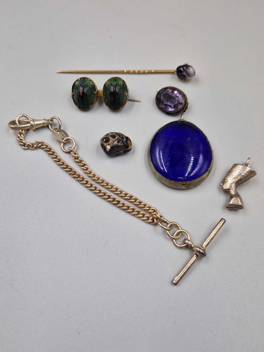 Lot 94 - A hallmarked silver Albert bracelet with t-bar,...