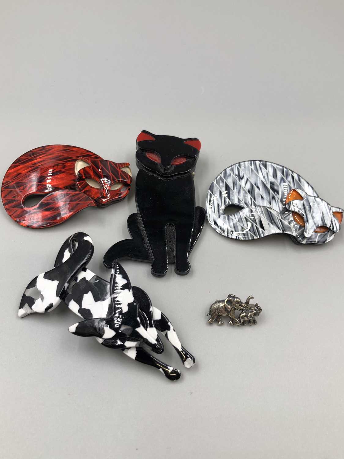Lot 92 - Four Lea Stein style brooches, three in the...