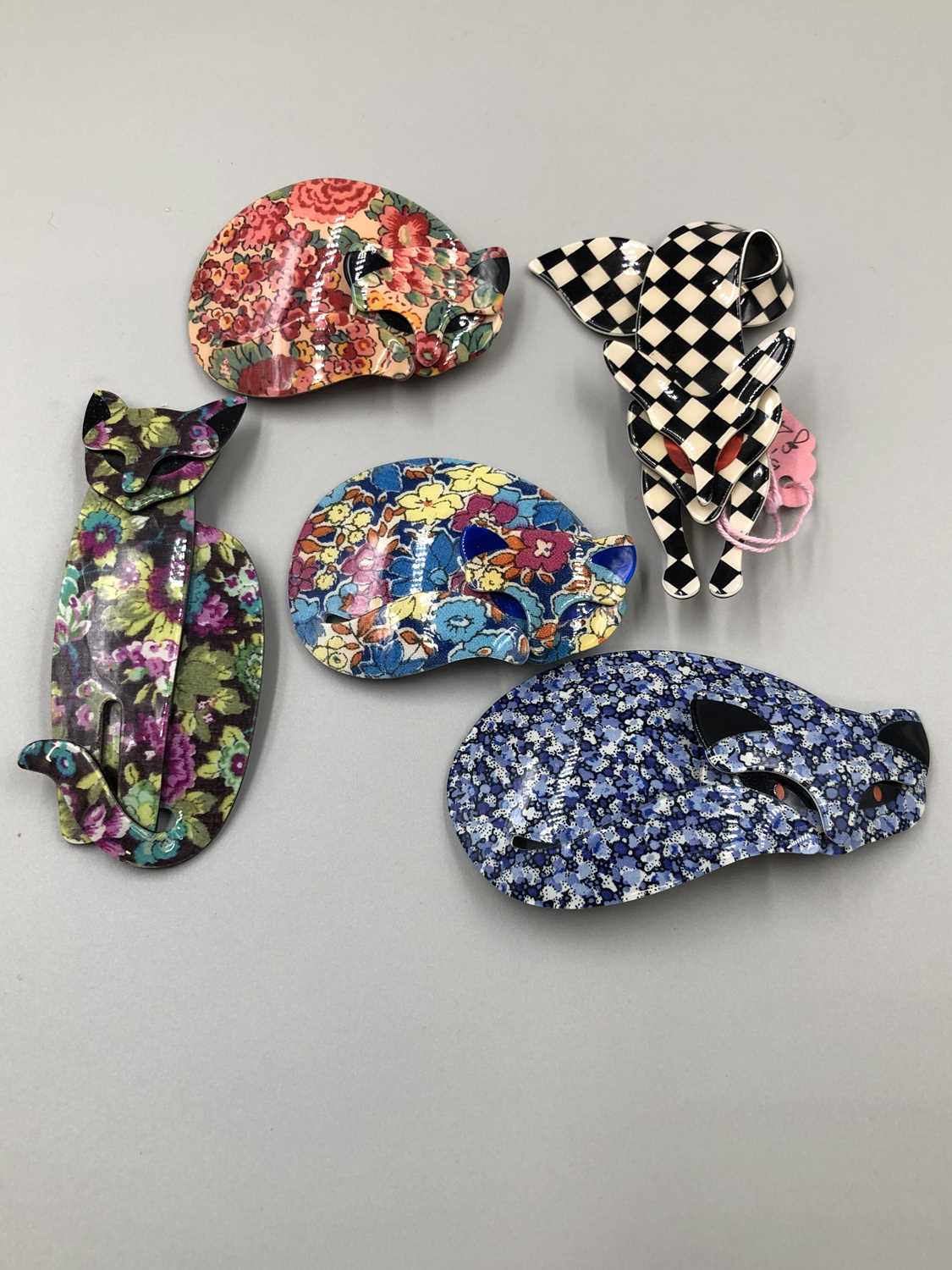 Lot 12 - Lea Stein. Five signed Lea Stein brooches. One...