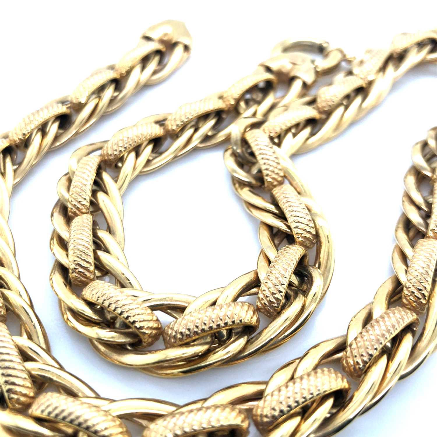 Lot 14 - An Italian-made 9ct-made fancy link neck chain....