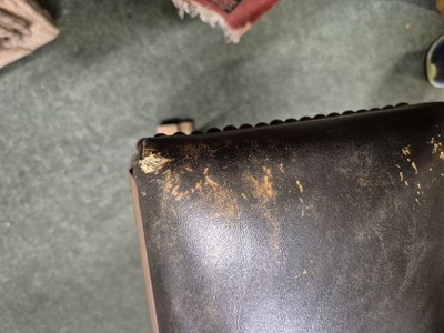 Lot 894 - A green leather seated brass club fender....