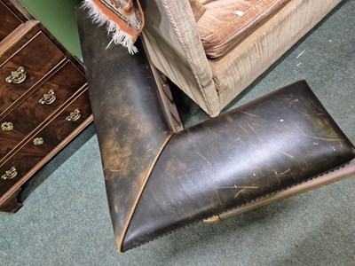 Lot 894 - A green leather seated brass club fender....