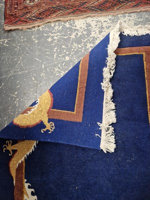 Lot 1526 - A Tibetan dragon rug 189 x 92 cm