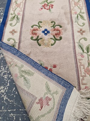 Lot 1535 - An oriental Chinese design rug 127 x 65 cm